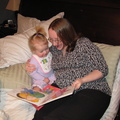 Abigail and Heather reading a book
