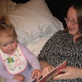 Abigail and Heather reading a book